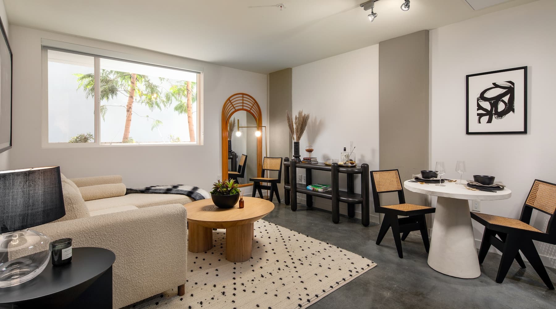 spacious living room with easy access to other rooms and includes areas for dining